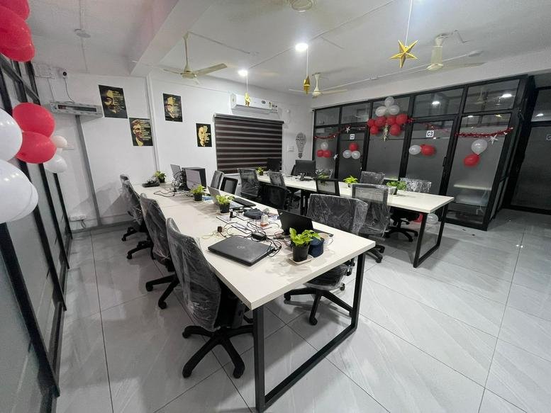 Spacious open-plan workspace at Galactic Hive, Velappa Gounder Nagar, Saravanampatti, Coimbatore.