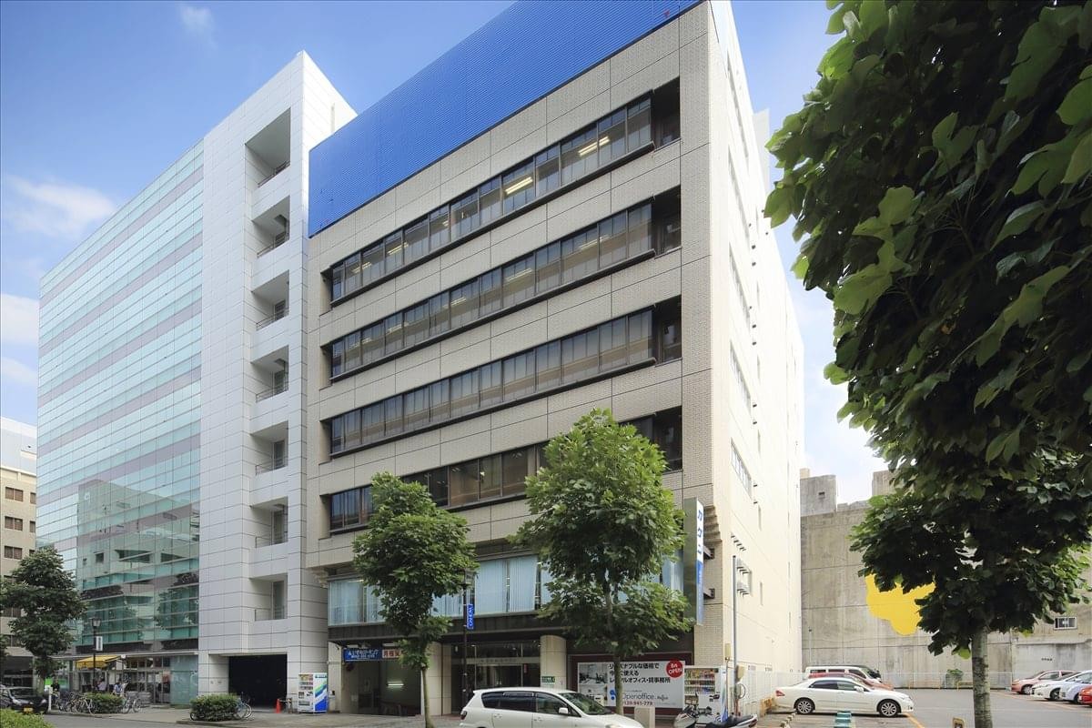 Exterior view of the Yagihyo Tenmacho Building with its modern glass and concrete facade.