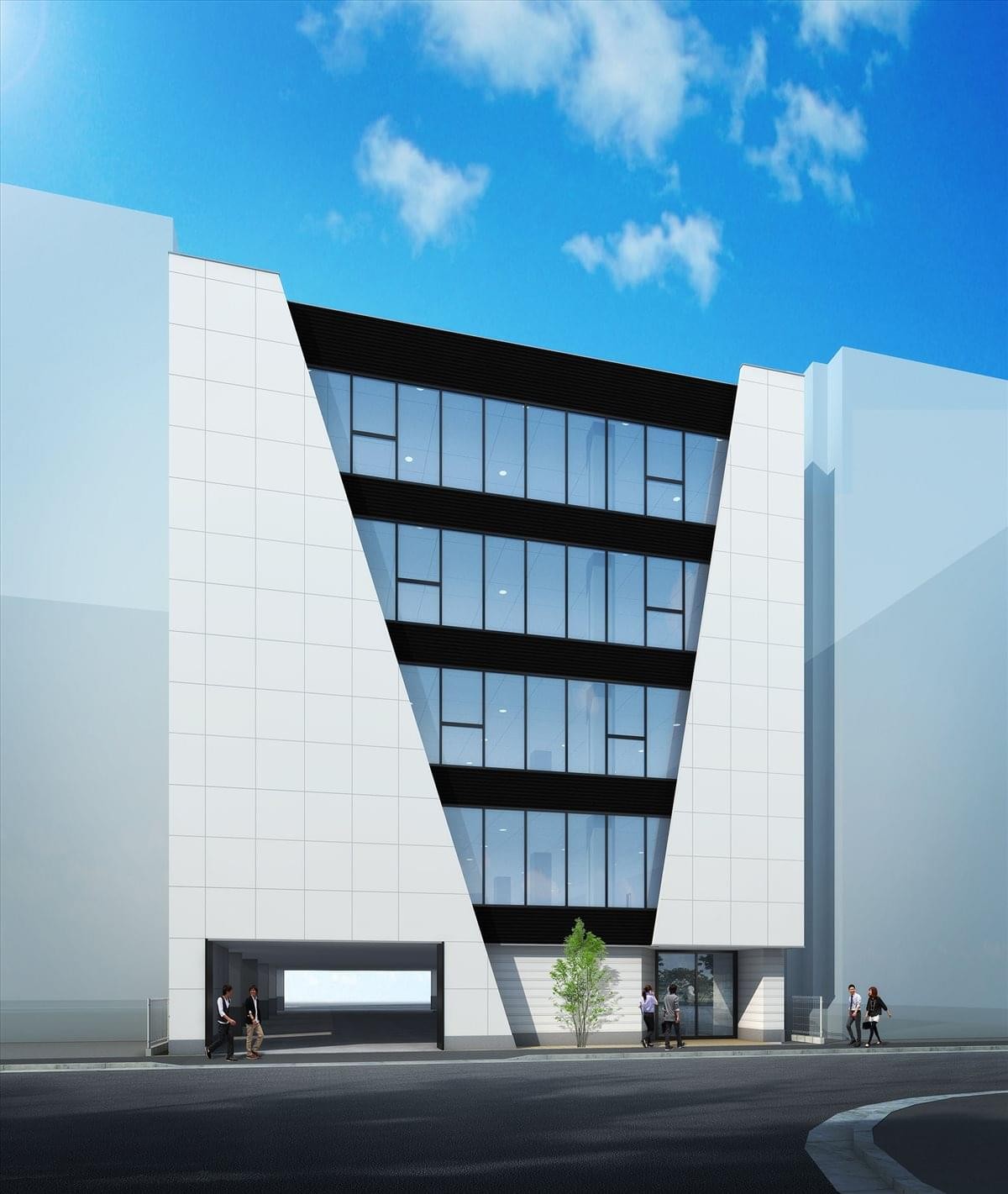 Exterior view of the modern Yamato Bldg with its unique geometric black and white facade.