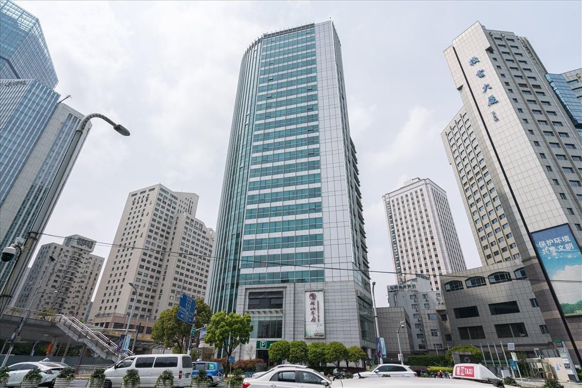 Exterior view of the glass-facade Zhabei Centro skyscraper in Shanghai.