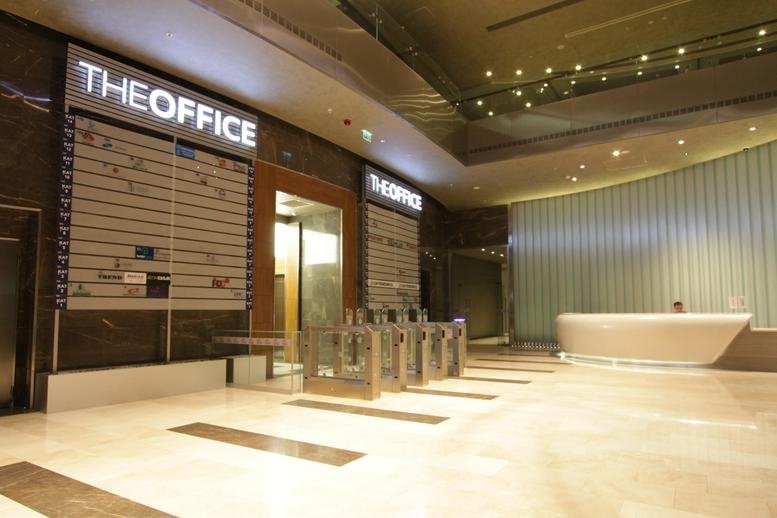 Building entrance with secure turnstiles at Mall of İstanbul, Suite 136.