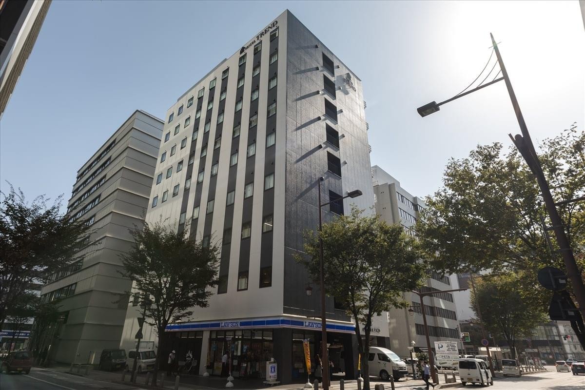 Exterior view of the multi-story Okayama Across Cube Building, Shimoishii, Kita-Ku, Okayama-Shi.