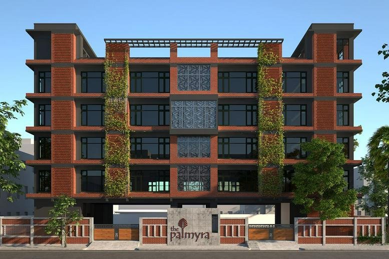 Exterior view of the red brick facade with vertical gardens at Palmyra.