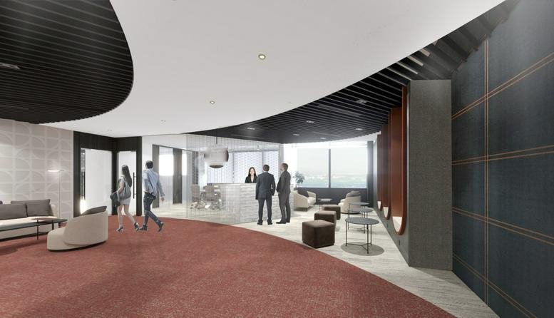 Spacious modern reception area with curved ceilings, red carpeting, and comfortable lounge seating.