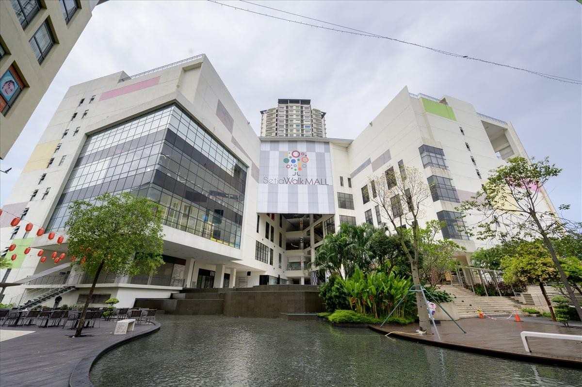 Exterior view of the white facade and modern architecture at SetiaWalk Mall (Block K).