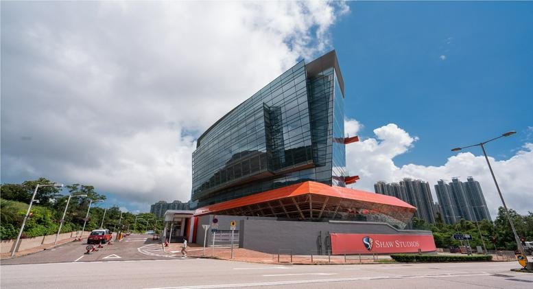 Exterior view of the modern, glass-facade Shaw House, Level 1, Shaw Studios building.