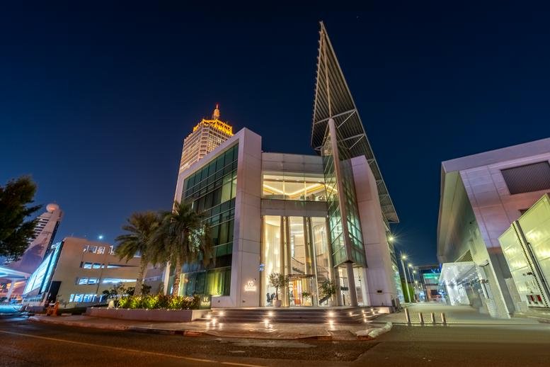 Exterior view of the glass-facade Dubai World Trade Centre on Sheikh Zayed Road.