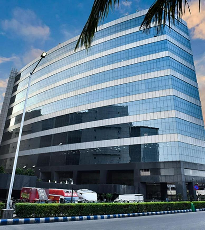 Exterior view of the multi-story glass facade building at Skyline Icon.