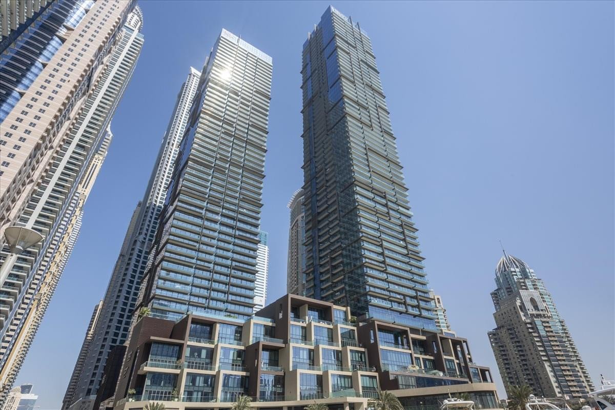 Exterior view of the high-rise glass towers of The Residences at Marina Gate.