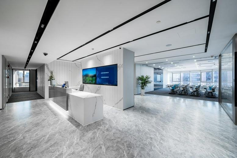 Modern lobby at Tower 3, Chengdu International Finance Center with marble floors and a sleek reception desk.