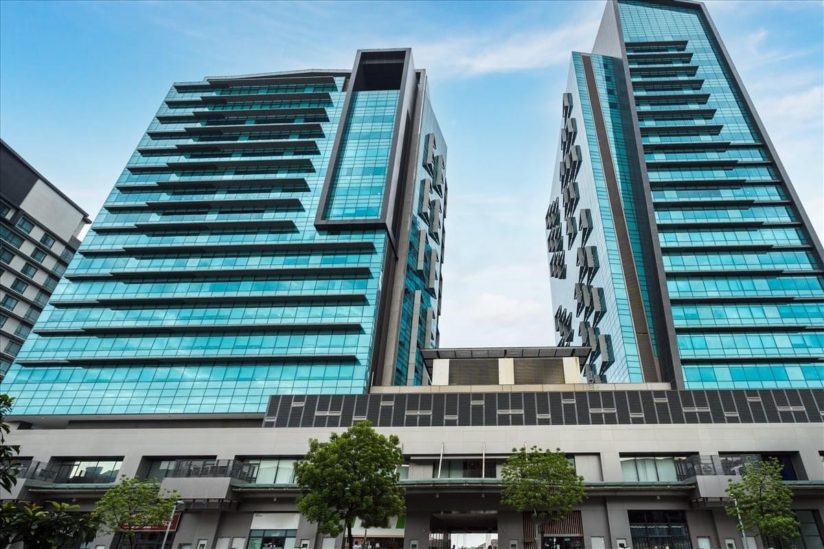 Exterior view of the glass-facade Tower 4 at PFCC, Jalan Puteri 1/2.