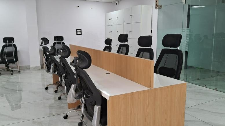 Spacious open-plan workspace at Shimla enclave Shimla enclave, Shimla Bypass Road featuring modern ergonomic chairs.