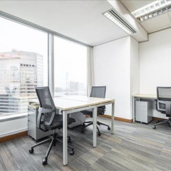 Private office space with two desks and city views, Central Plaza, Wan Chai, Hong Kong.