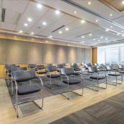 Large seminar room with rows of chairs and modern lighting, Wan Chai, Hong Kong.