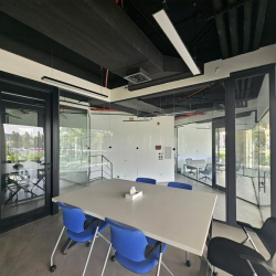 Open workspace with sleek desks and wide views of the urban landscape.