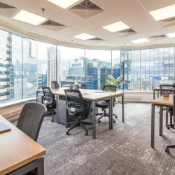 Spacious open-plan lounge and bar area with stylish lighting, Causeway Bay, Hong Kong.