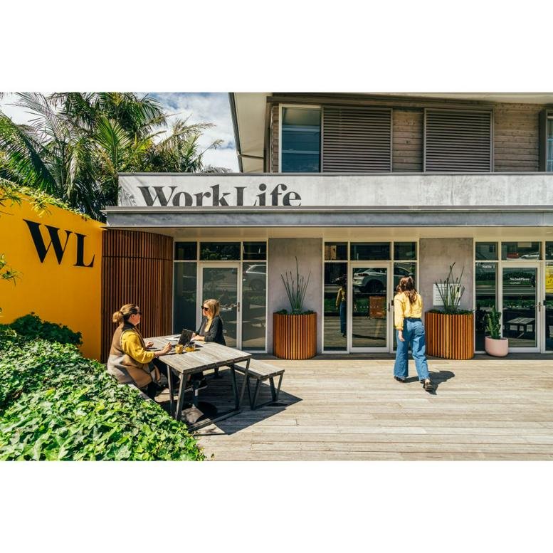 Exterior entrance and outdoor seating area of Work Life at 741-743 Lawrence Hargrave Drive.