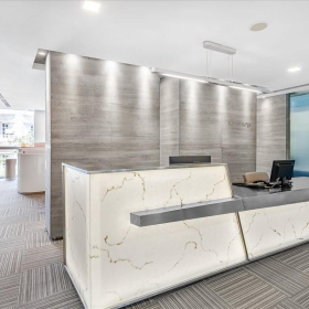 Modern marble reception desk with wood panelled walls at 41A Ly Thai To, Hanoi.. Click for details.